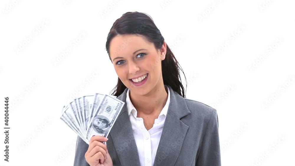 Businesswoman holding American banknotes is smiling Businesswoman holding American banknotes is smiling
