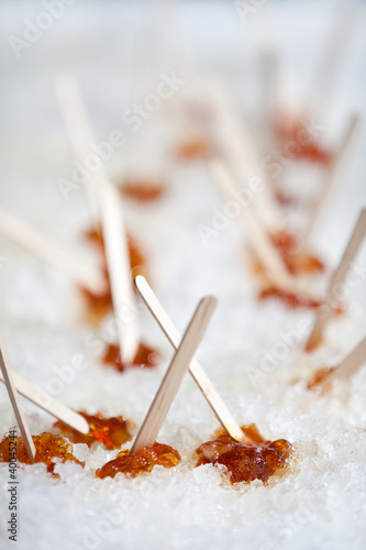 Maple taffy on snow for desert at a sugar shack