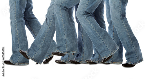 A woman takes one step forward