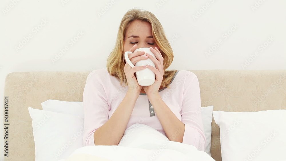 Happy woman drinking a coffee Happy woman drinking a coffee
