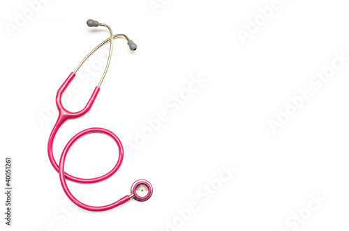 Pink medical stethoscope  isolated on white