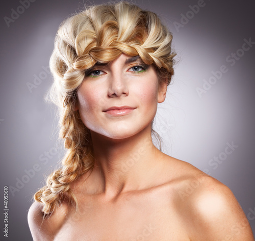 Beautiful woman with stylish hairstyle