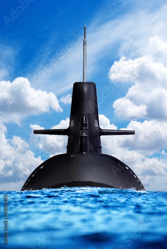 Nuclear submarine in the ocean. photo