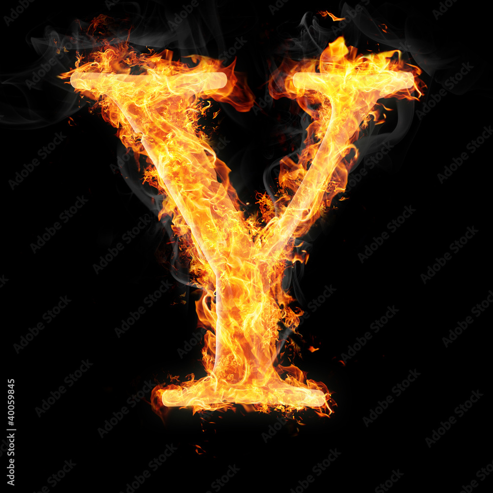 Fototapeta premium Fonts and symbols in fire on black background - Y