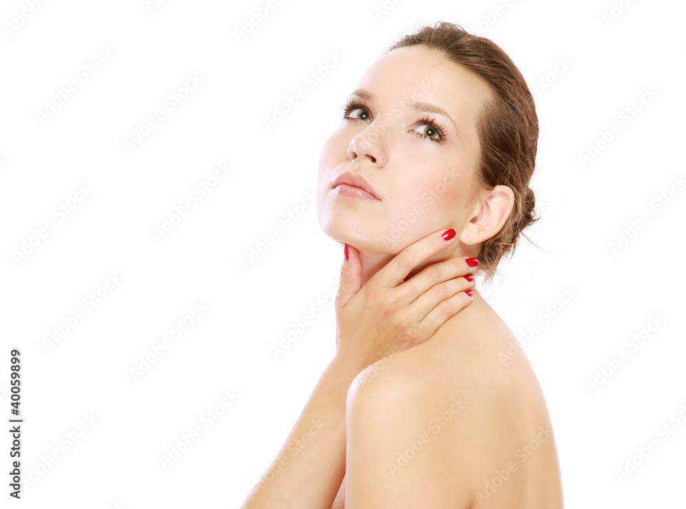 A beautiful woman touching her face, isolated on white A beautiful woman touching her face, isolated on white