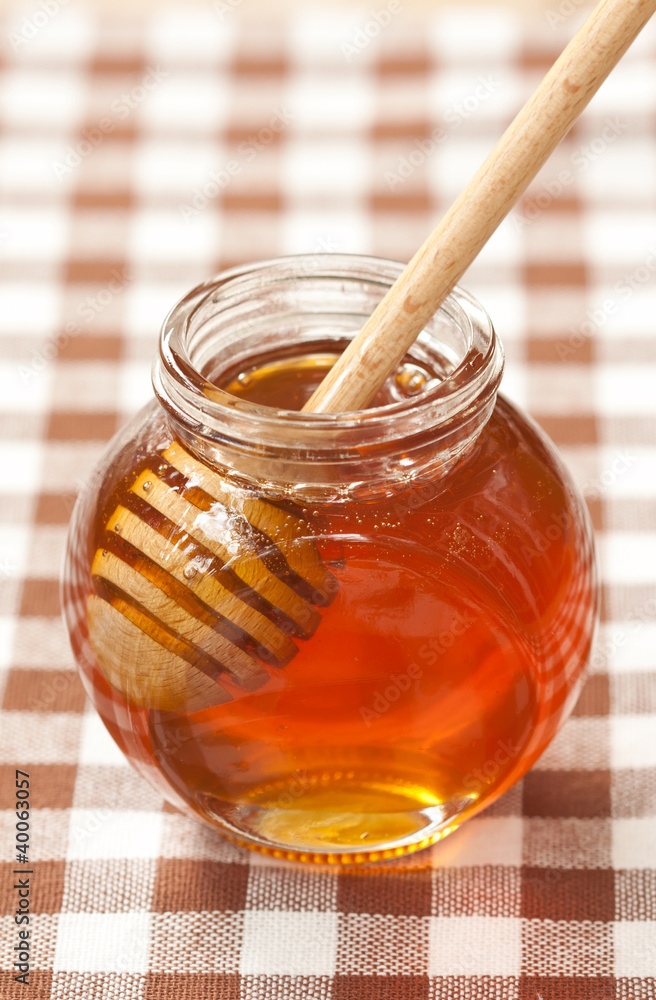 Honey and wood dipper Honey and wood dipper