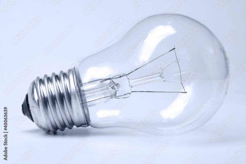 A glowing bulb, closeup, isolated on white A glowing bulb, closeup, isolated on white