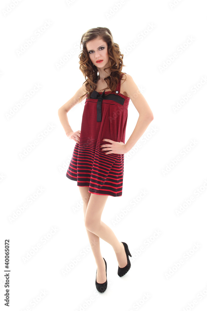 young model in red dress posing over white background young model in red dress posing over white background