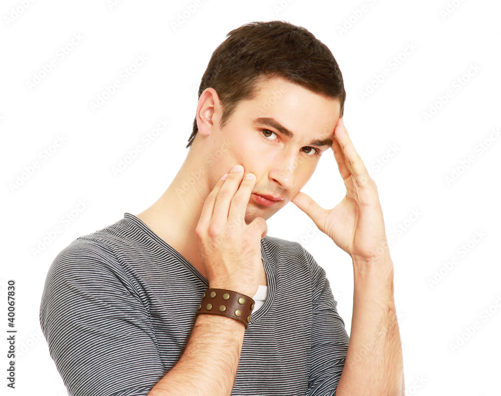 A man with a headache, close-up, isolated on white background A man with a headache, close-up, isolated on white background