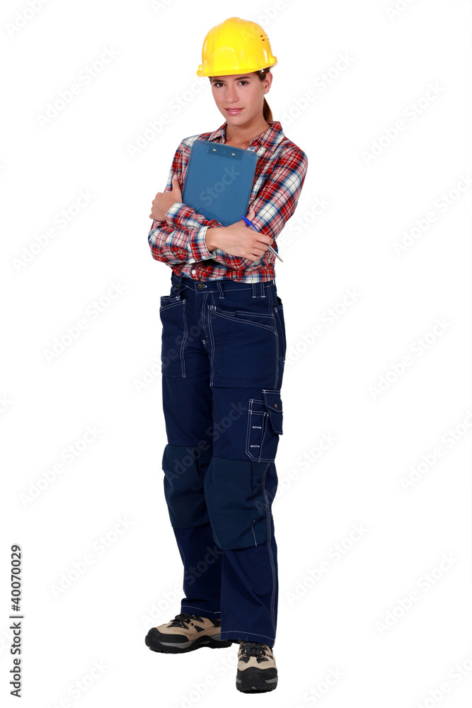 A female foreman with a clipboard. A female foreman with a clipboard.