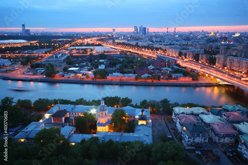Beautiful pink sunset, panorama of Moscow, Moscow river