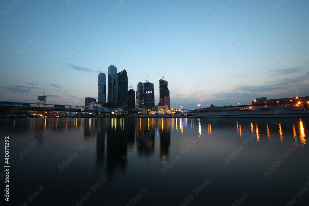New Moscow City business complex at evening; reflection in river