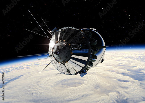 Fototapeta Naklejka Na Ścianę i Meble -  The first spaceship at the Earth orbit