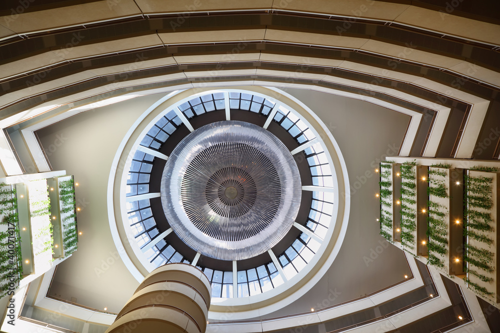 Obraz premium Large round dome in hotel, lot of floors and balconies