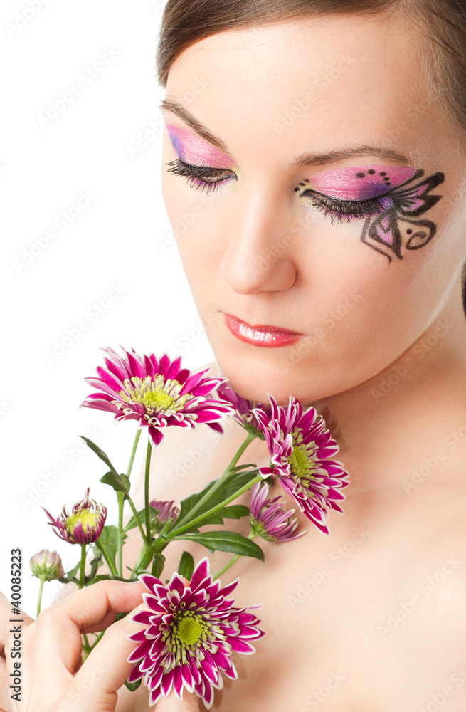 portrait of  woman with body art butterfly on face