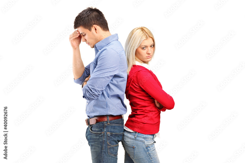 Couple with their backs turned after having an argument Couple with their backs turned after having an argument