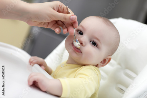 Baby spoon feeding