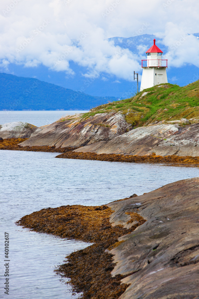 Lighthouse on fjord coast