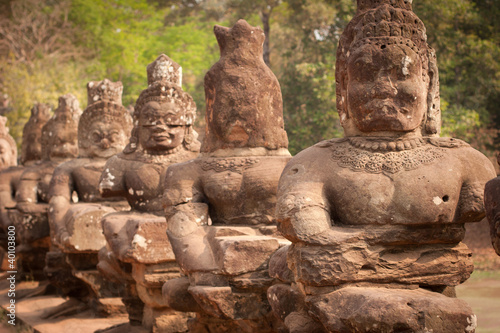 Buddha statues stacked along the road, Angkor Wat, Cambodia