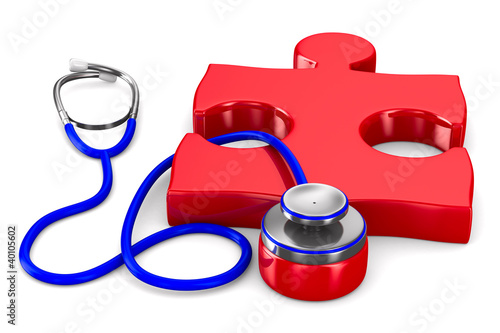 Stethoscope and puzzle on w...