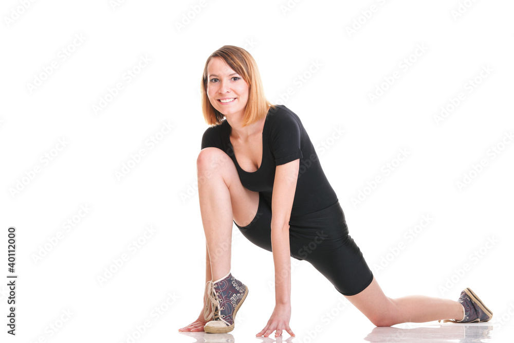Sport Young woman doing exercise isolated on white Sport Young woman doing exercise isolated on white
