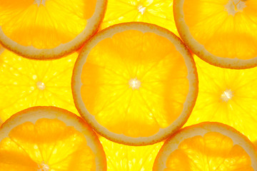 Keuken achterwand Plakjes fruit Sinaasappel partjes macro tegenlicht  © Taiga