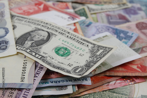Dollar and asian bank notes.