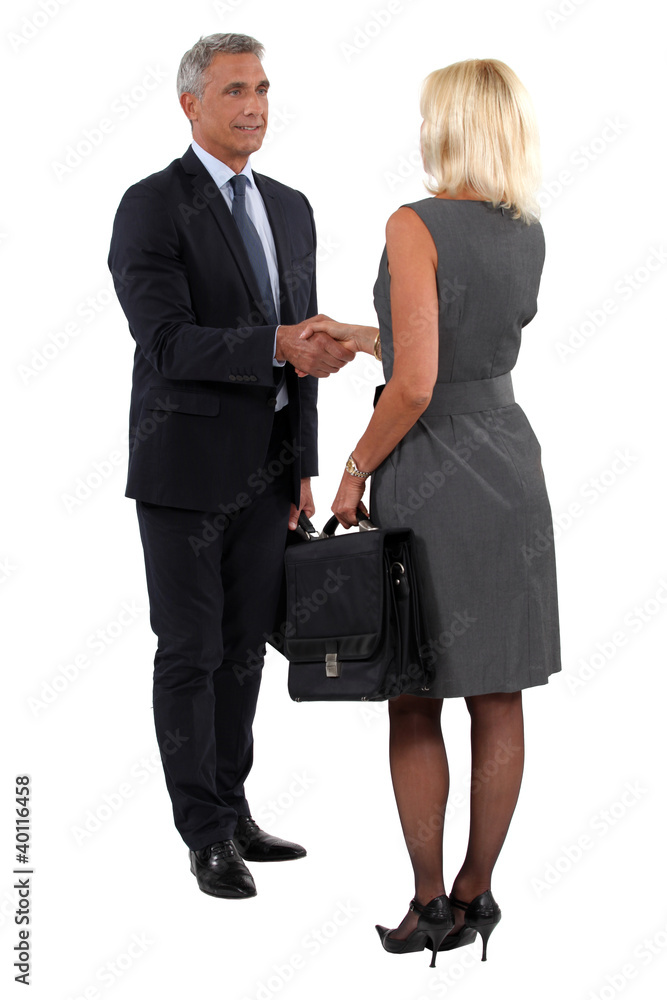 Two businesspeople shaking hands Two businesspeople shaking hands