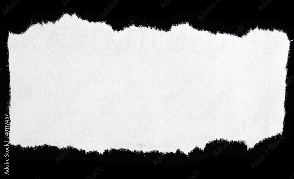 Fototapeta White rip torn newspaper paper clipping on black