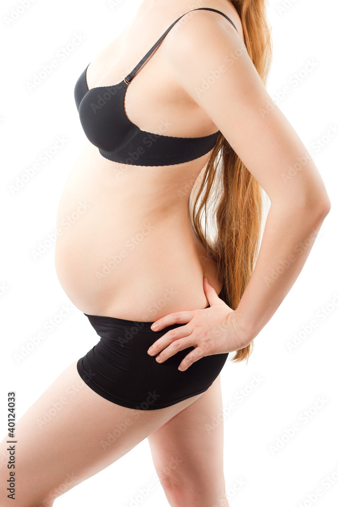 Pregnant young woman in lingerie Pregnant young woman in lingerie