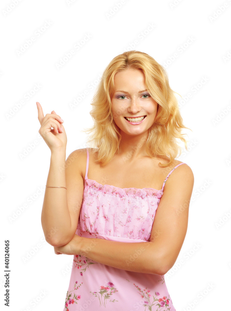 A smiling woman pointing up, isolated on white A smiling woman pointing up, isolated on white