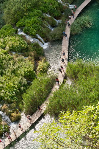 Group touring waterfalls of Plitvitse lake national park photo