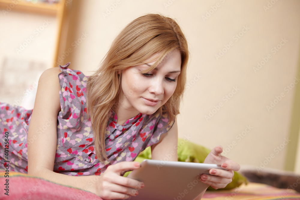woman holding a touchpad pc woman holding a touchpad pc