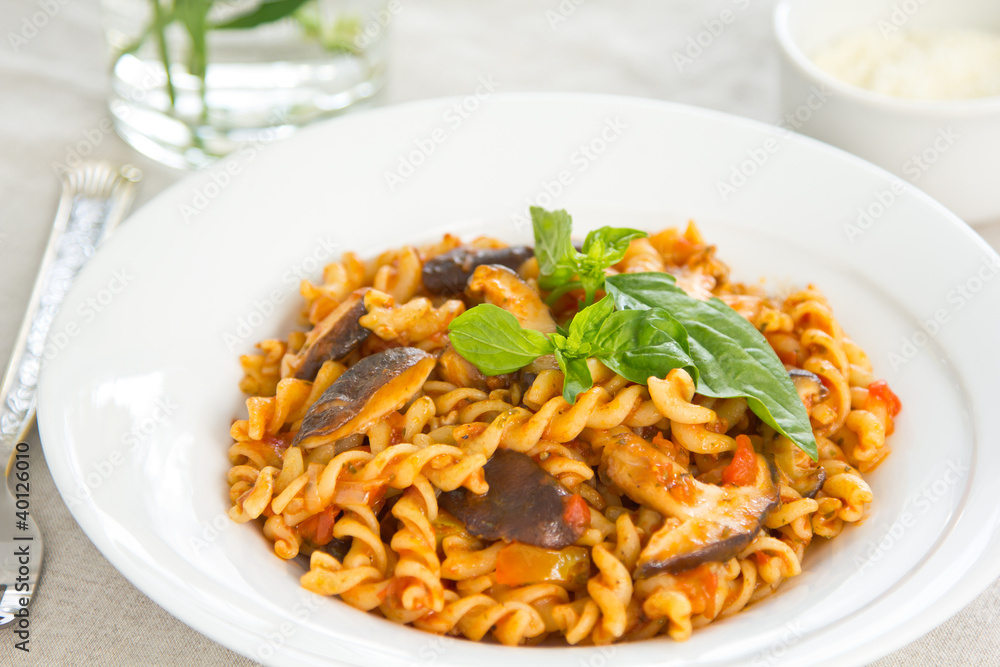 Fusili with mushroom in tomato sauce