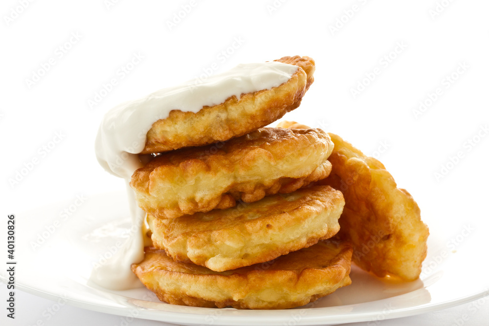 fried fritters on a white plate fried fritters on a white plate