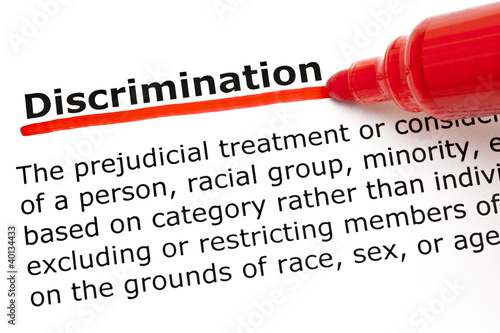 Dictionary definition of the word Discrimination underlined with red marker
