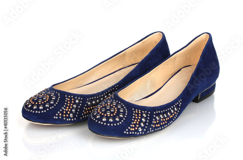 Elegant blue flat shoes for women in stones isolated on white