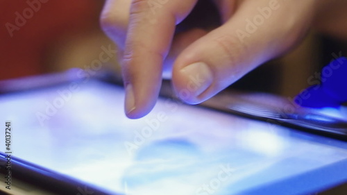 looking at pictures on touchscreen tablet-pc