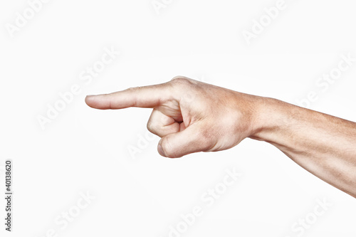 Arm and index finger on a white background. © sergojpg