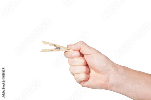 Clothespin in his hand. On a white background.