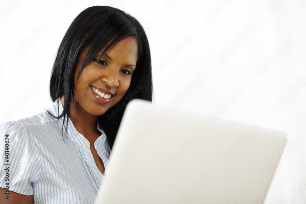 Pretty young woman using a laptop Pretty young woman using a laptop