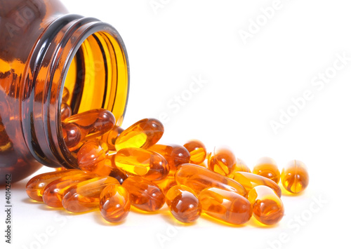 Obraz na płótnie Fish oil bottle and capsules