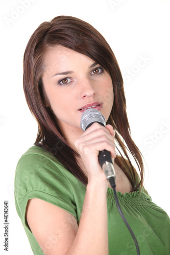 Brunette holding microphone