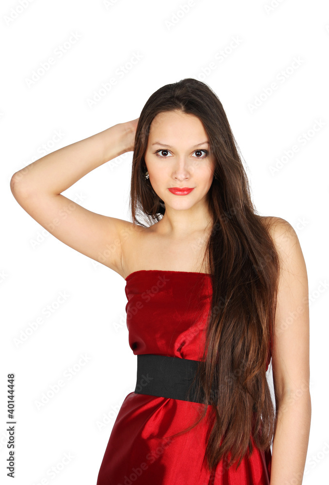 Young girl wearing red dress touches to hair Young girl wearing red dress touches to hair