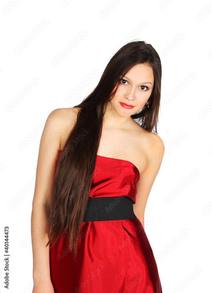Beautiful girl wearing long red dress stands