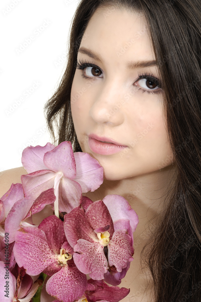 Young girl holding bouquet orchid flower in her hands Young girl holding bouquet orchid flower in her hands