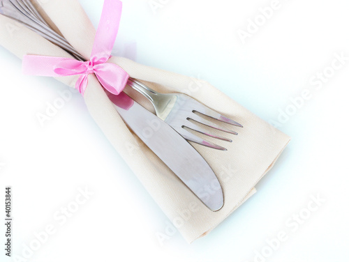 fork and knife on napkin isolated on white