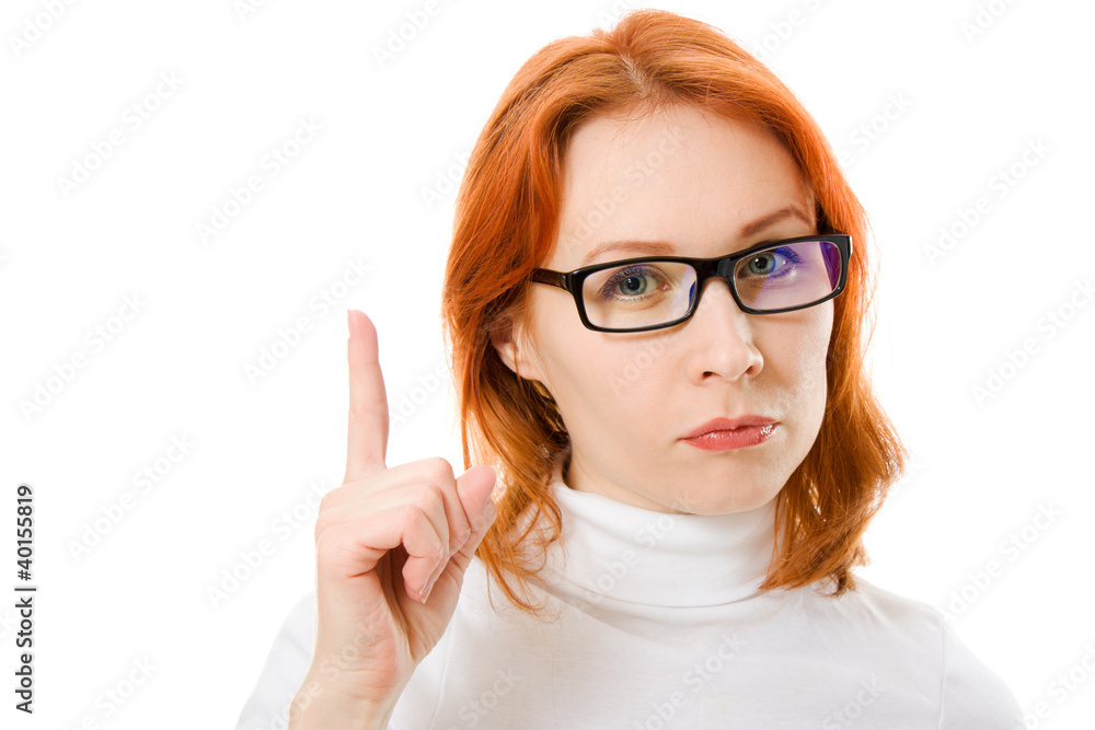 A beautiful girl with red hair wearing glasses A beautiful girl with red hair wearing glasses