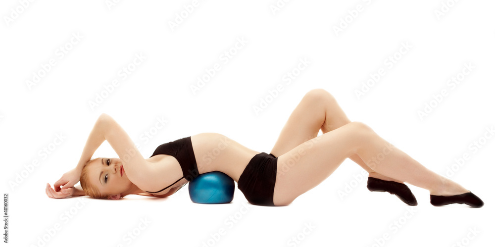 beauty girl in black cloth lay on gymnastic ball