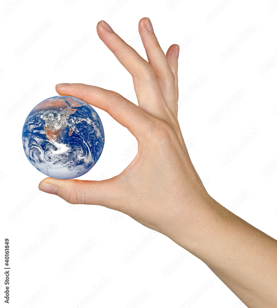 Planet earth on finger.Elements of this image furnished by NASA Planet earth on finger.Elements of this image furnished by NASA